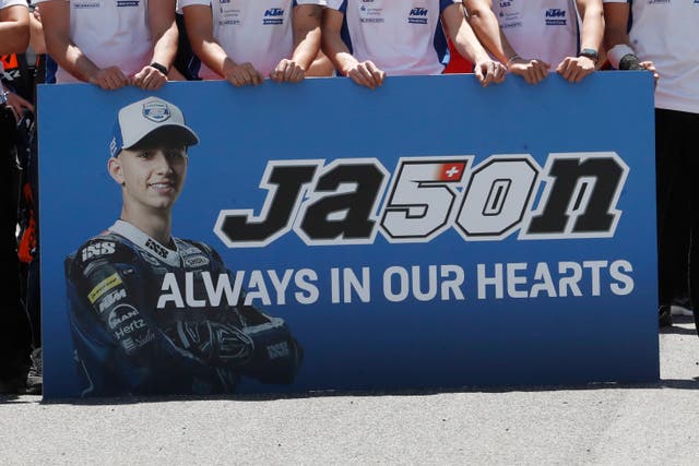 Team-mates of 19-year-old Jason Dupasquier observed a minute's silence in his memory prior to the start of the Motogp Grand Prix of Italy
