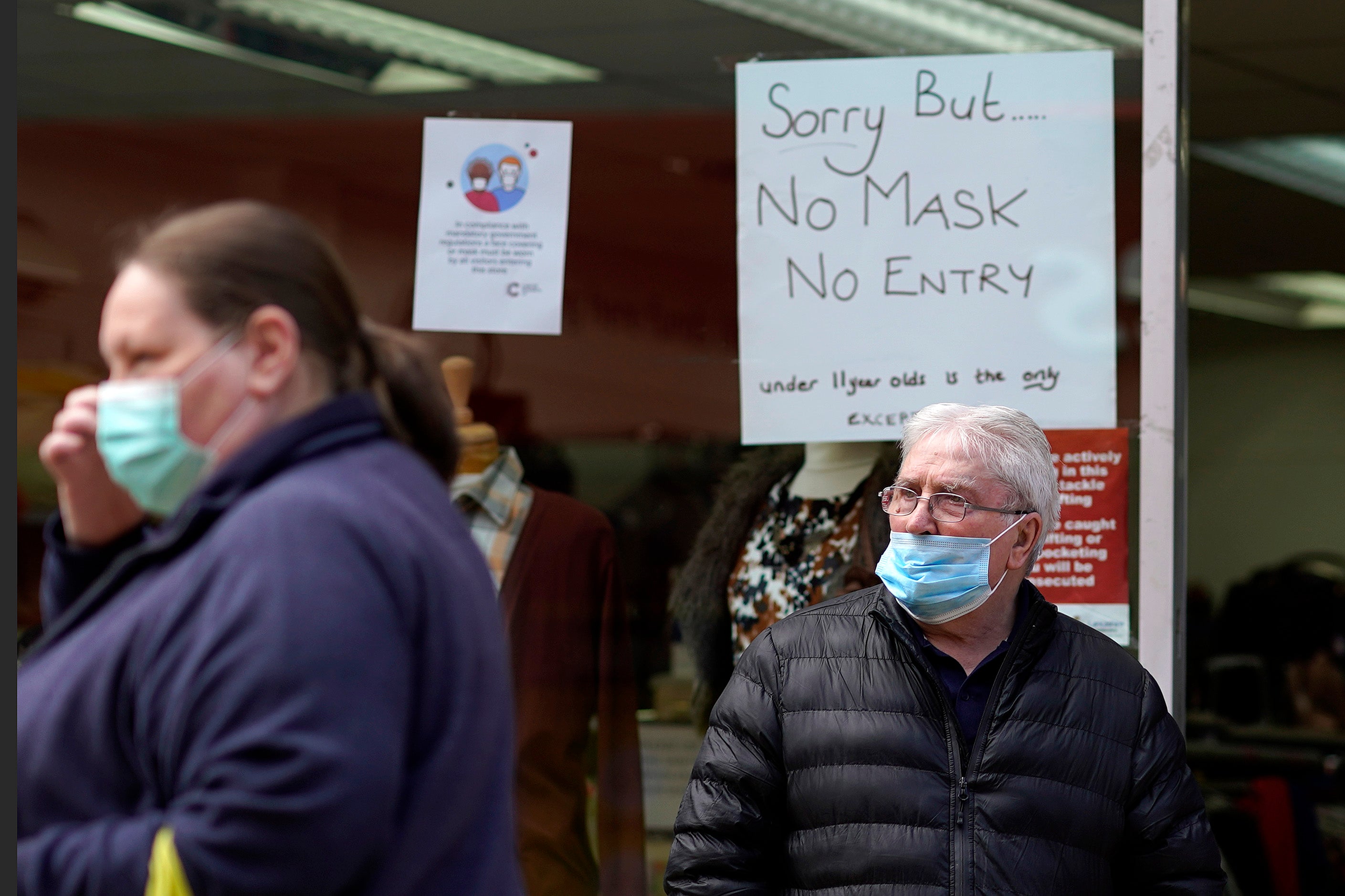 Shoppers wear face masks in Blackburn town centre on July 24, 2020 in Blackburn, England. Blackburn with Darwen has seen a rise in coronavirus cases.