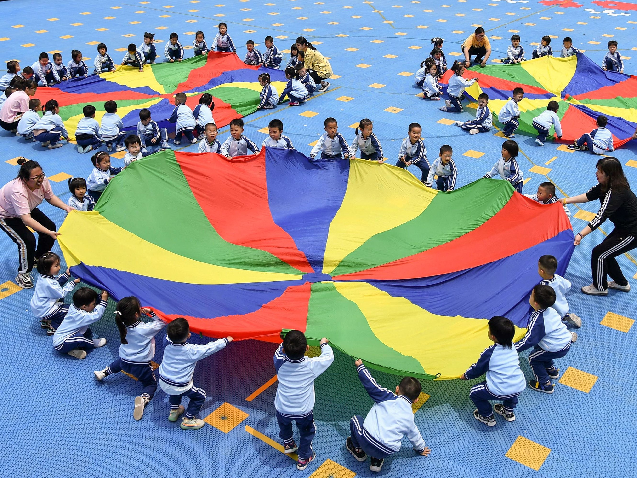 Children play at a kindergarten in Yantai, Shandong, on 31 May 2021
