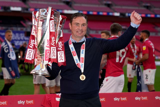 <p>Morecambe manager Derek Adams refused to commit his future to the club after they reached the third tier of English Football for the first time in their history</p>