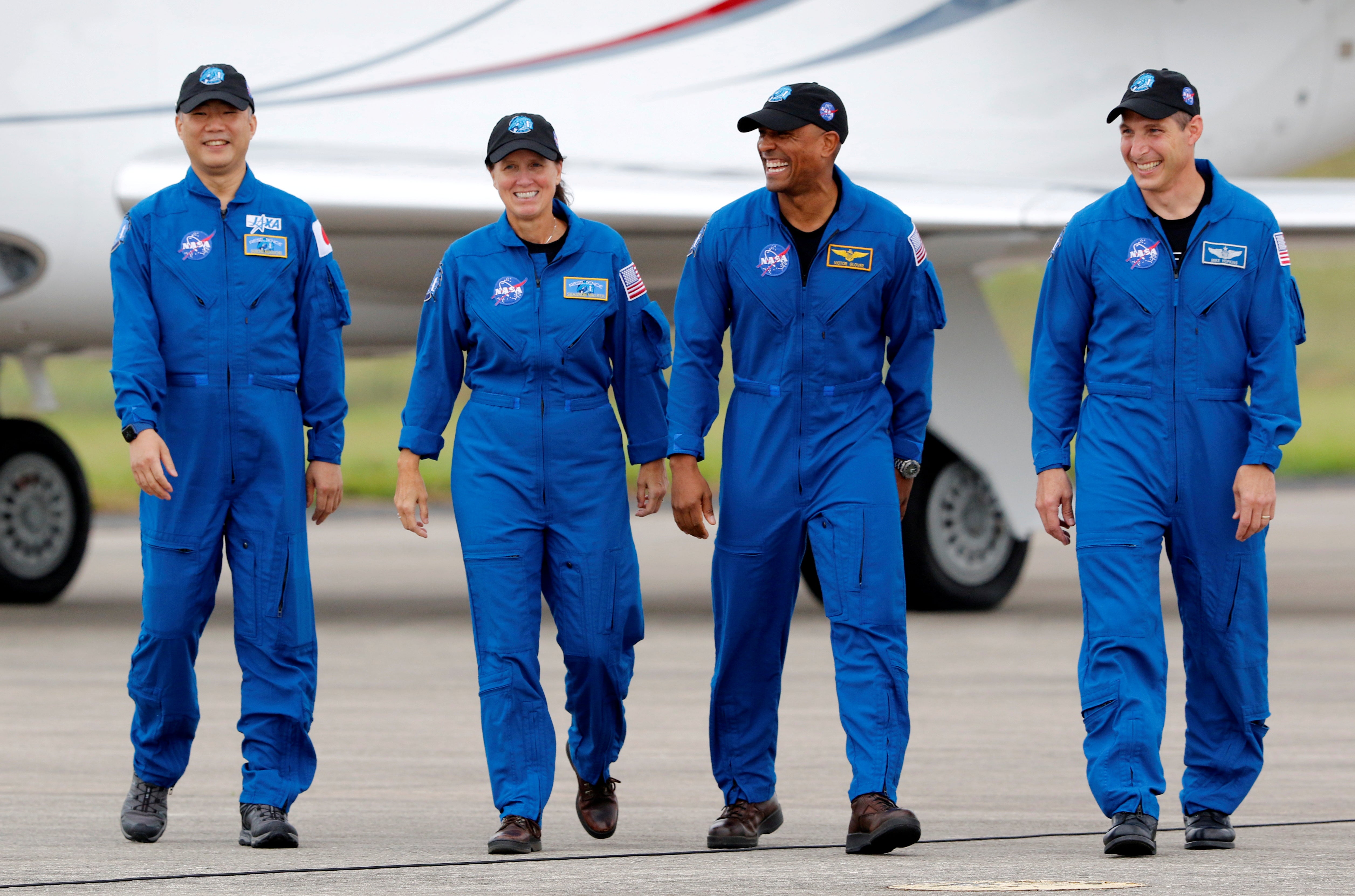 File image: NASA astronauts Shannon Walker, Victor Glover, Mike Hopkins, and JAXA (Japan Aerospace Exploration Agency) astronaut Soichi Noguchi, who comprise Crew-1, walk at Kennedy Space Center ahead of the NASA/SpaceX launch of the first operational commercial crew mission in Cape Canaveral, Florida, US, 8 November, 2020
