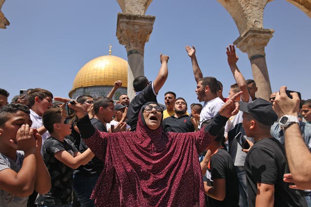 <p>Palestinians attend Friday prayers in Jerusalem's Al-Aqsa mosque, the third holiest site of Islam, which is also revered by Jews as the Temple Mount</p>