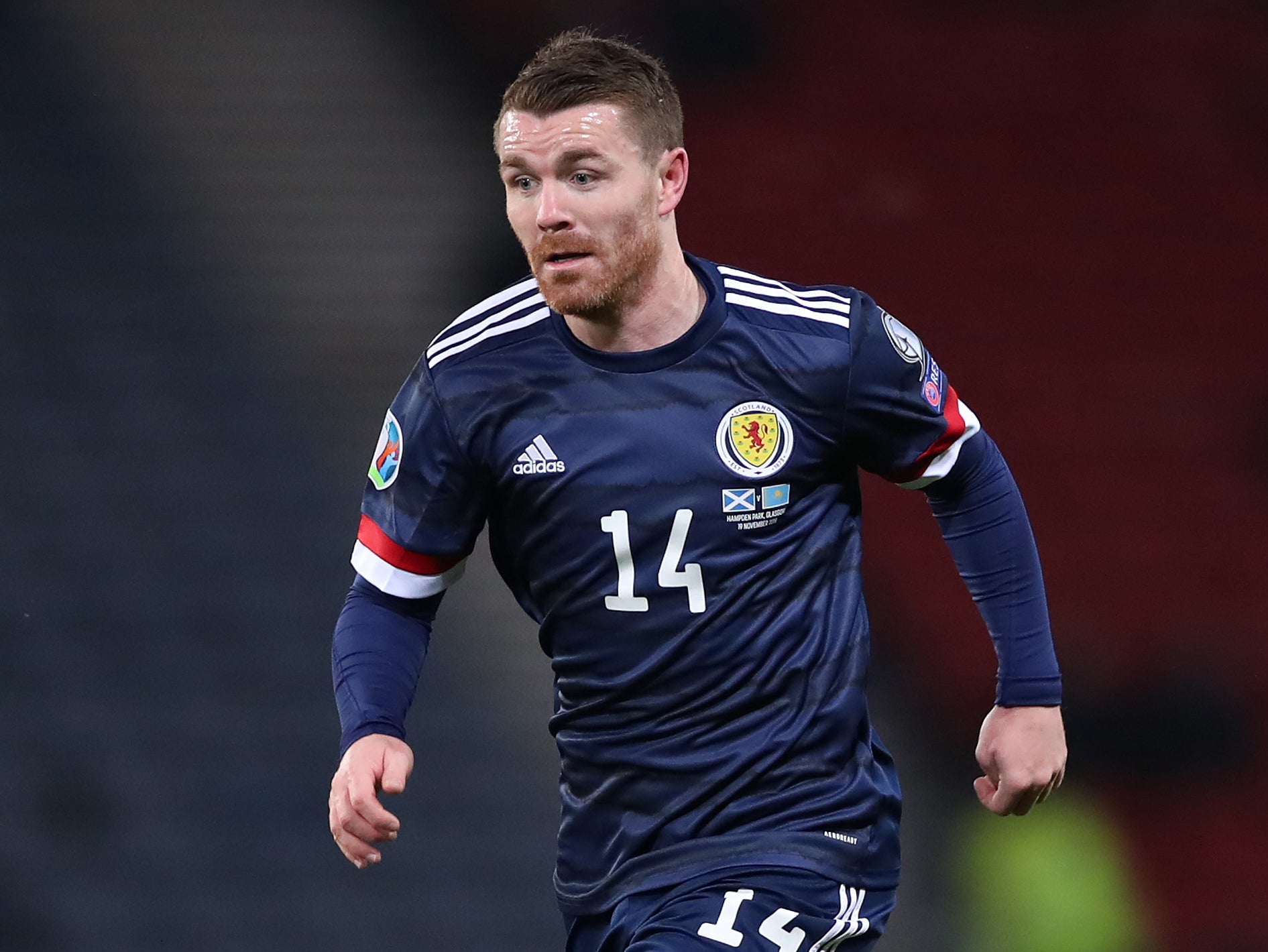 <p>John Fleck in action for Scotland</p>