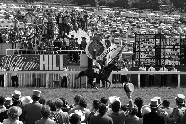 Shergar and Walter Swinburn cross the line well clear to win the Derby by a record margin in 1981