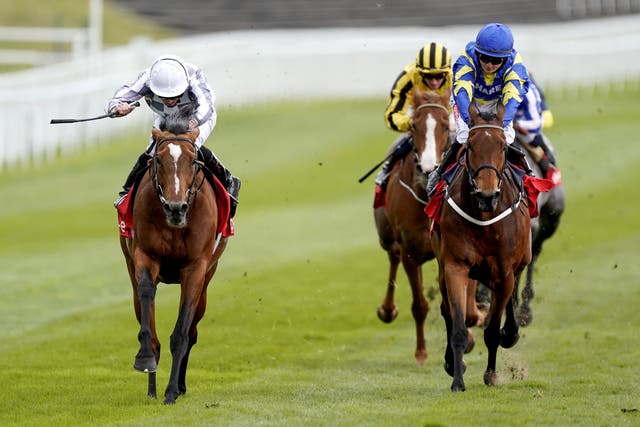 Japan (left) winning the Ormonde Stakes at Chester