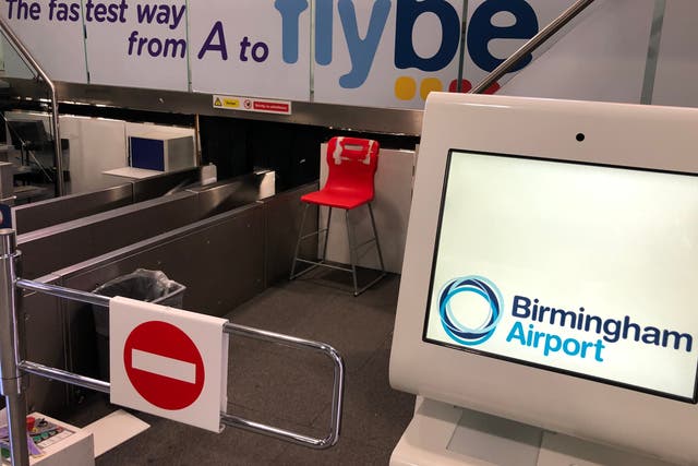 <p>No way: Flybe check-in desks at Birmingham airport on the day the airline collapsed</p>