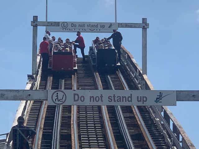 <p>Visitors had to be guided down from the Grand National rollercoaster ride at Blackpool Pleasure Beach, Lancashire, on Tuesday afternoon</p>
