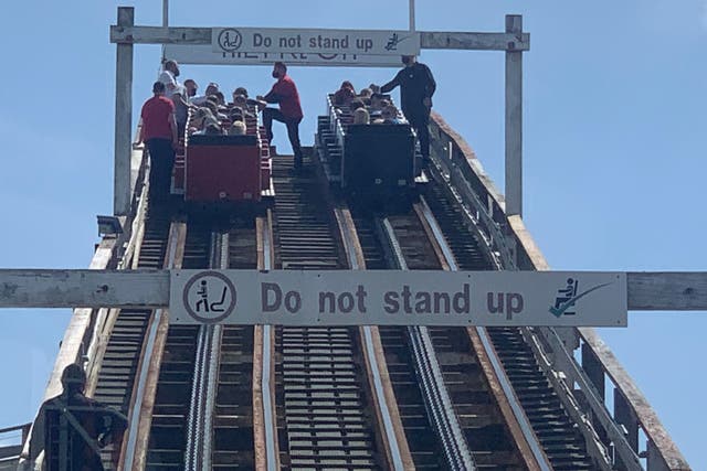 <p>Visitors had to be guided down from the Grand National rollercoaster ride at Blackpool Pleasure Beach, Lancashire, on Tuesday afternoon</p>