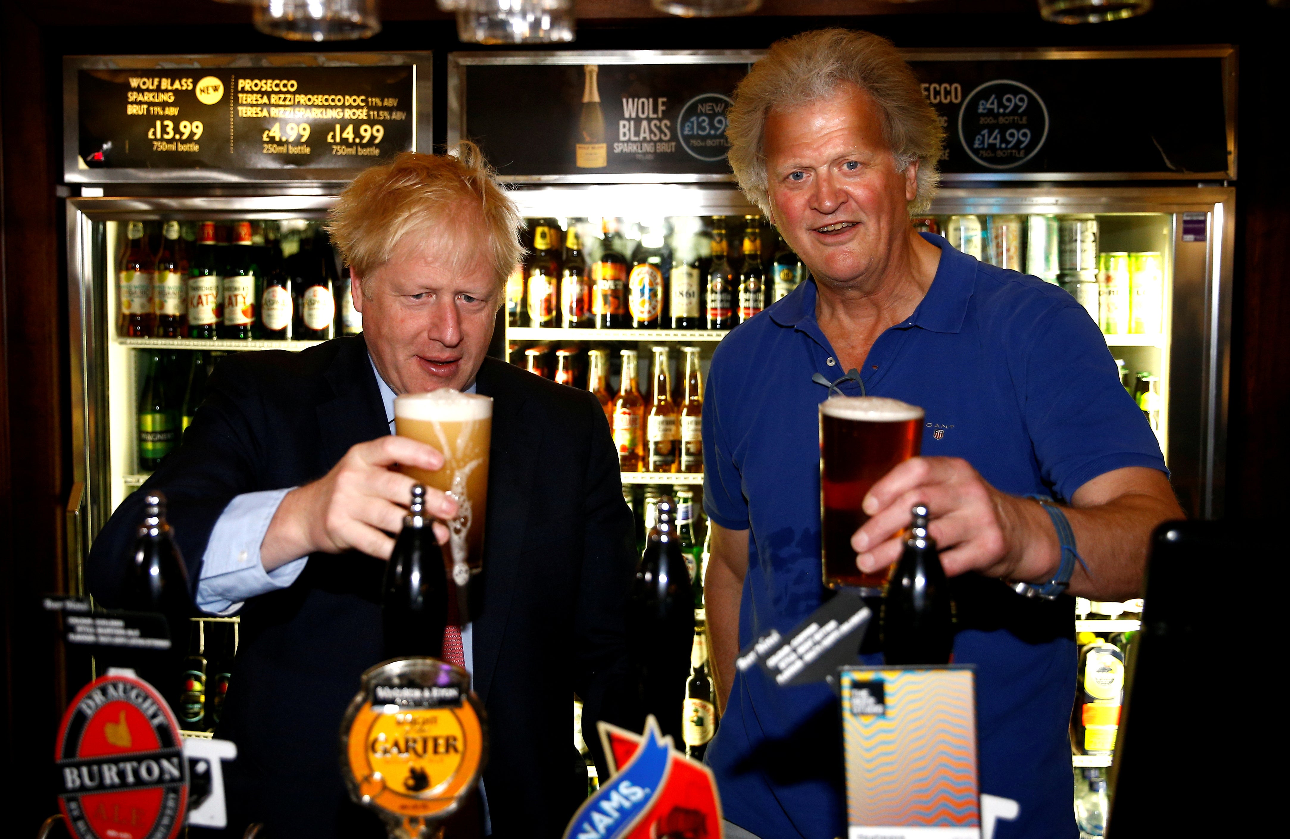 <p>Pulling another one: Boris Johnson meets pub group chairman Tim Martin at Wetherspoon's Metropolitan Bar in London</p>
