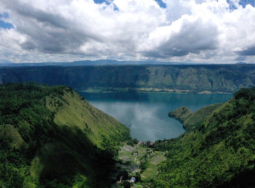 <p>Indonesia’s Lake Toba was formed by a gigantic volcanic eruption some 70,000 years ago</p>