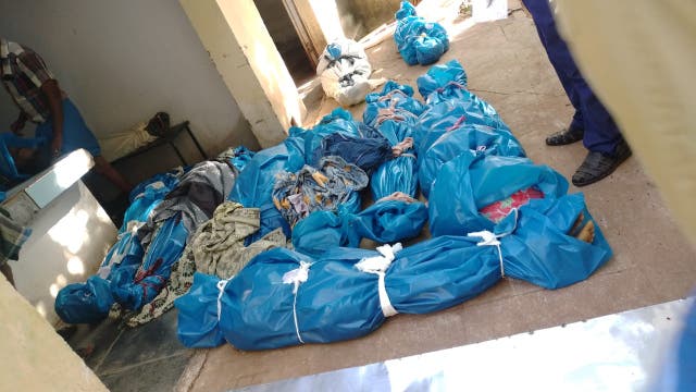 <p>Dead bodies of the Covid patients lying on the floor of the mortuary of Theni K Vilakku Government Hospital in Tamil Nadu, India</p>