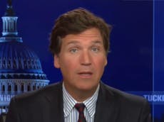 Tucker Carlson under fire for calling workplace vaccine requirement ‘medical Jim Crow’