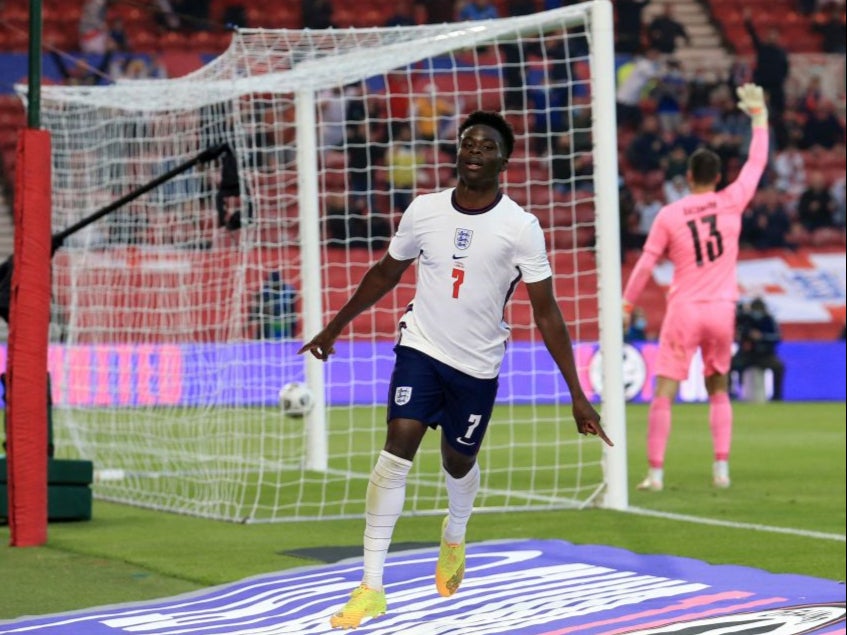Bukayo Saka celebrates scoring against Austria