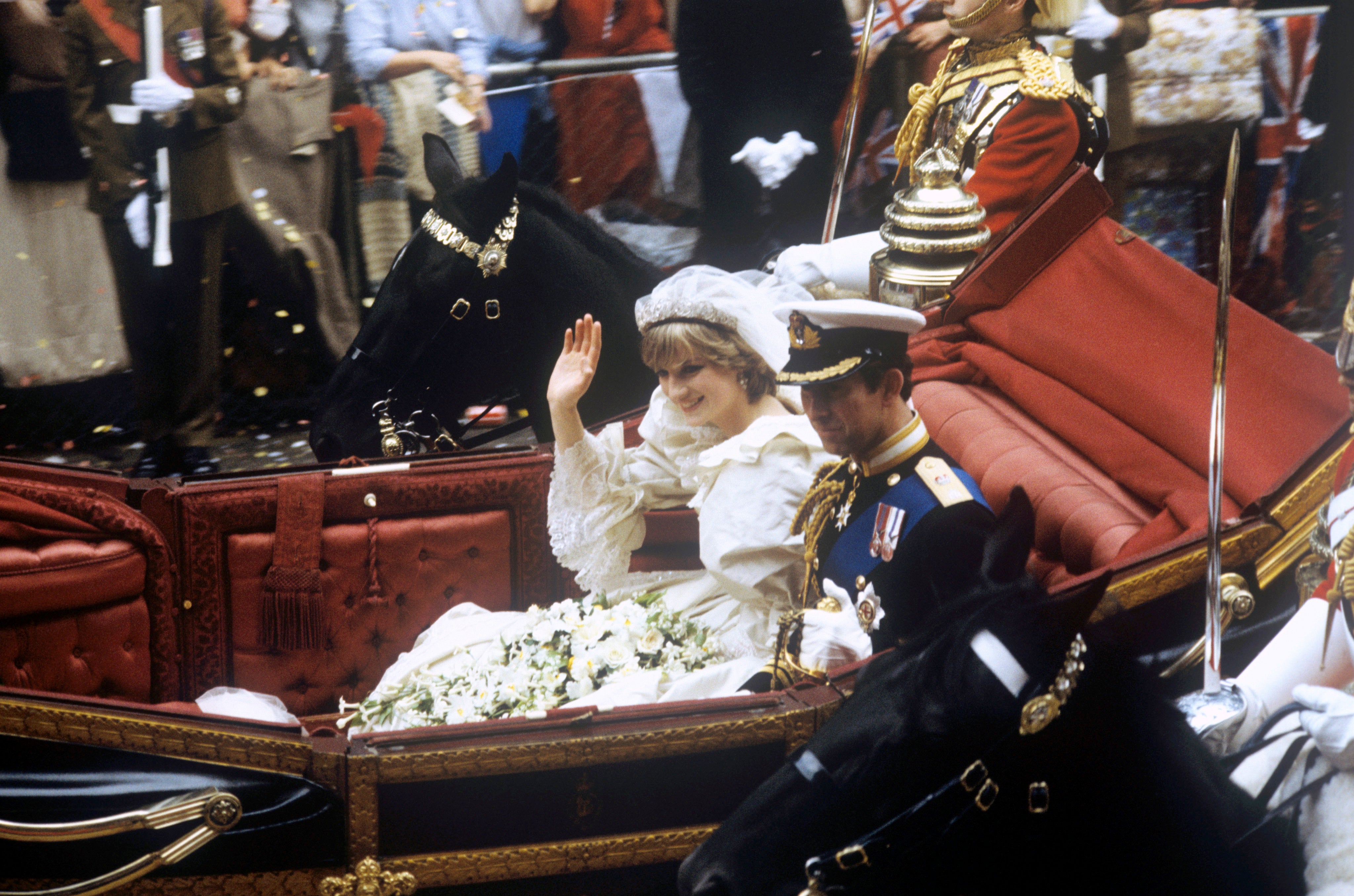 The Prince and Princess of Wales in a carriage after their wedding at St Paul’s Cathedral.