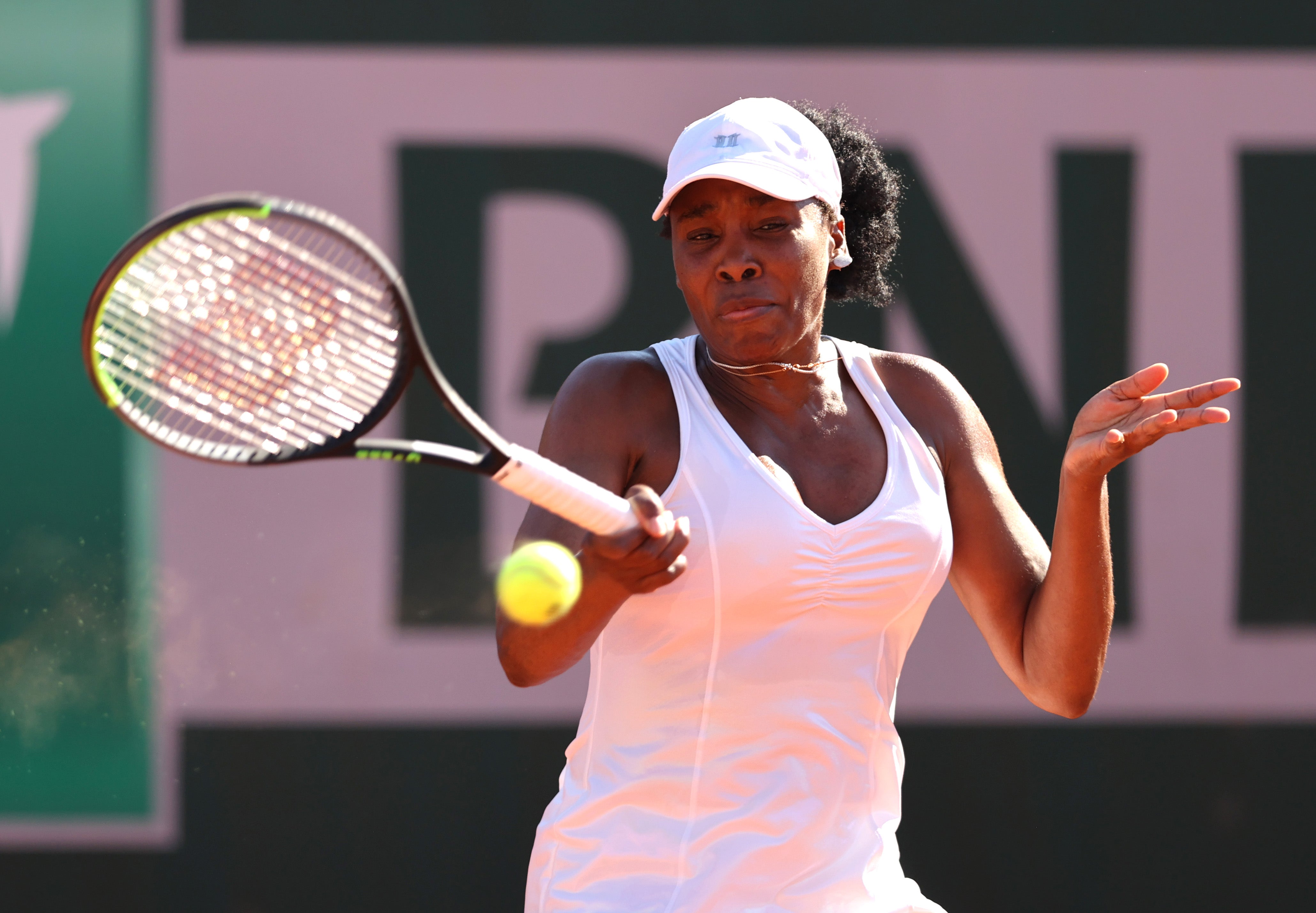 Venus Williams of The United States plays a forehand in their ladies first round match against Ekaterina Alexandrova of Russia during day three of the 2021 French Open at Roland Garros on 1 June, 2021 in Paris, France