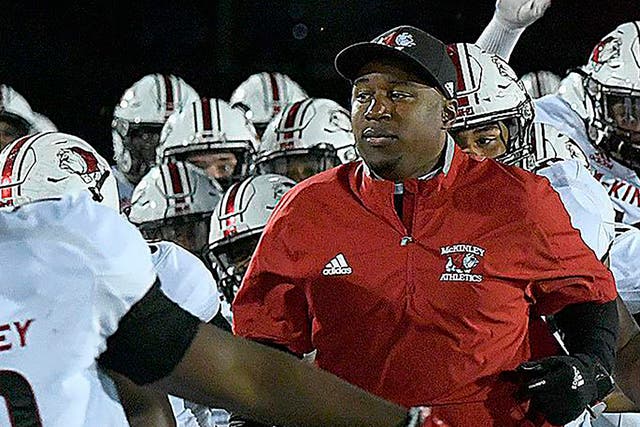<p>Canton McKinley High School football coach Marcus Wattley. Wattley and seven assistant coaches have been suspended by the Canton City School District after one of the players said coaches forced him to eat pork in violation of his religious beliefs</p>