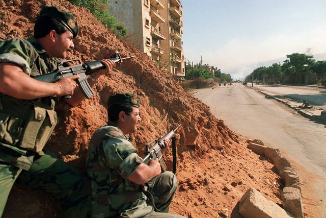 <p>Soldiers loyal to the then Lebanese president, Elias Hrawi, take up a position in Beirut in 1990</p>
