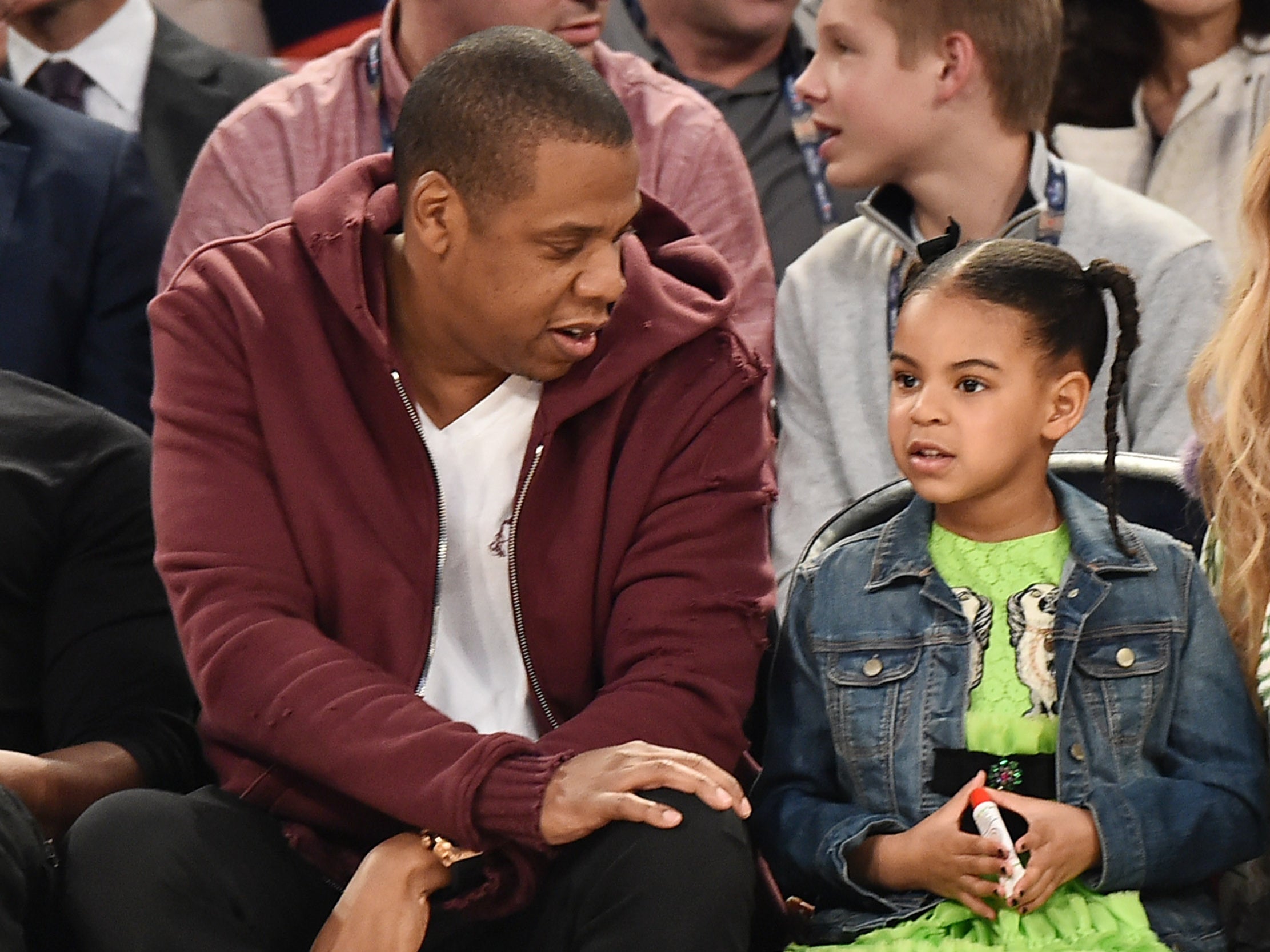 Jay Z and Blue Ivy Carter attend the 66th NBA All-Star Game