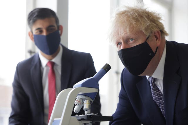 <p>Boris Johnson and his chancellor Rishi Sunak take part in a science lesson at King Solomon Academy in Marylebone, on 29 April 2021</p>