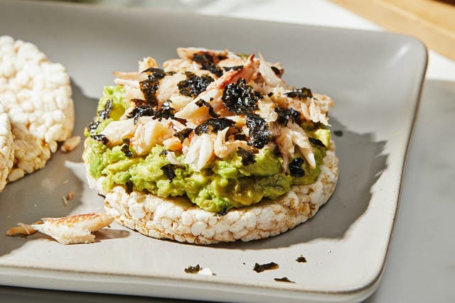 <p>The creaminess of the avocado with the crunch of the rice cake makes this a standout dish.</p>