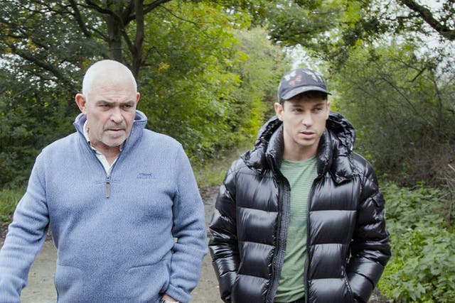 <p>Joey and his dad, Don, walking near his home in Essex and talking about therapy</p>