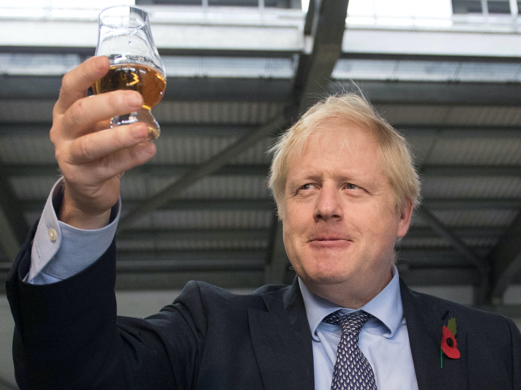 Boris Johnson toasts freedom from Covid restrictions while warning it may have to be postponed