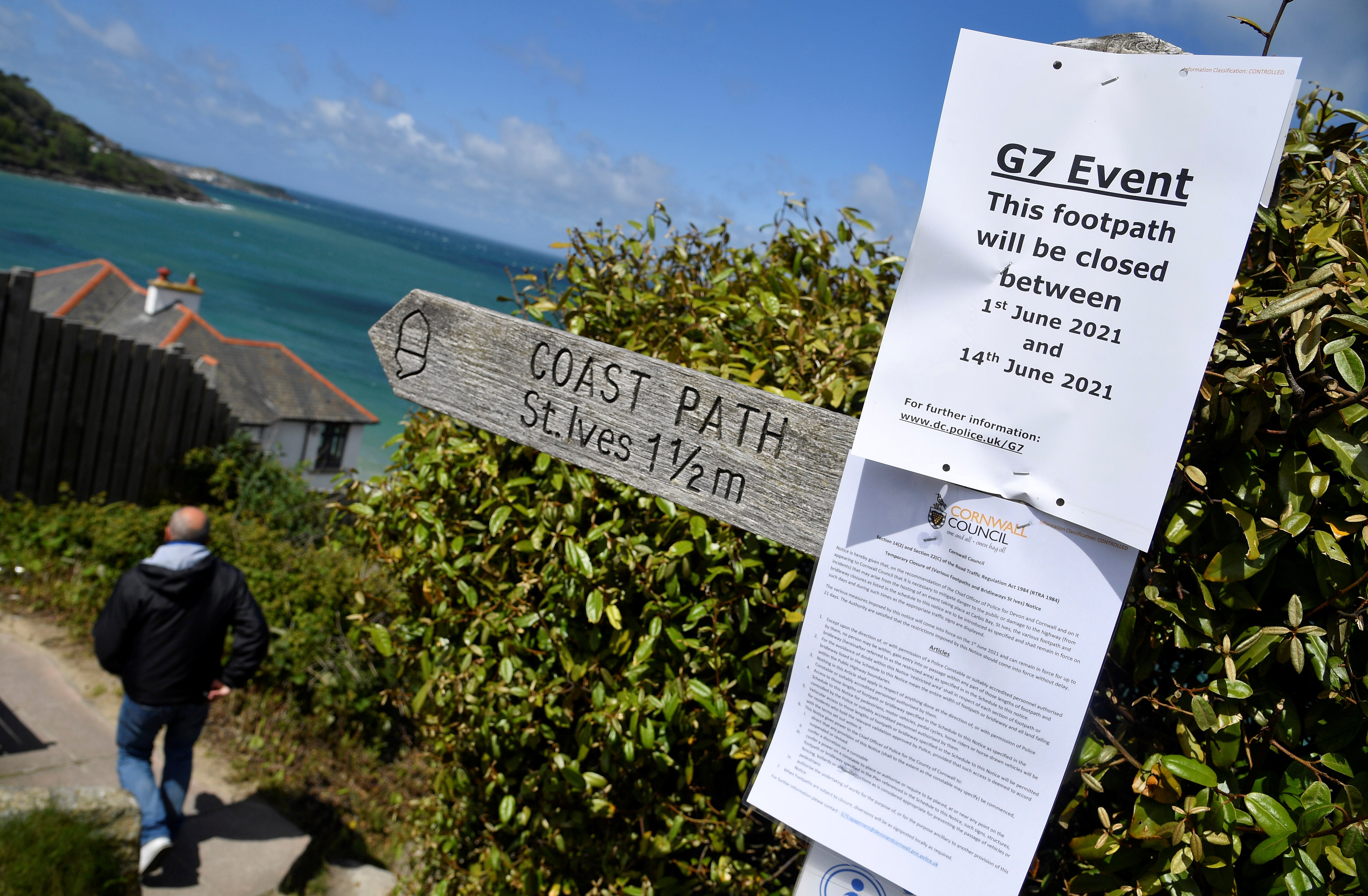 A sign notifying of an upcoming security closure of the coastal path near Carbis Bay resort