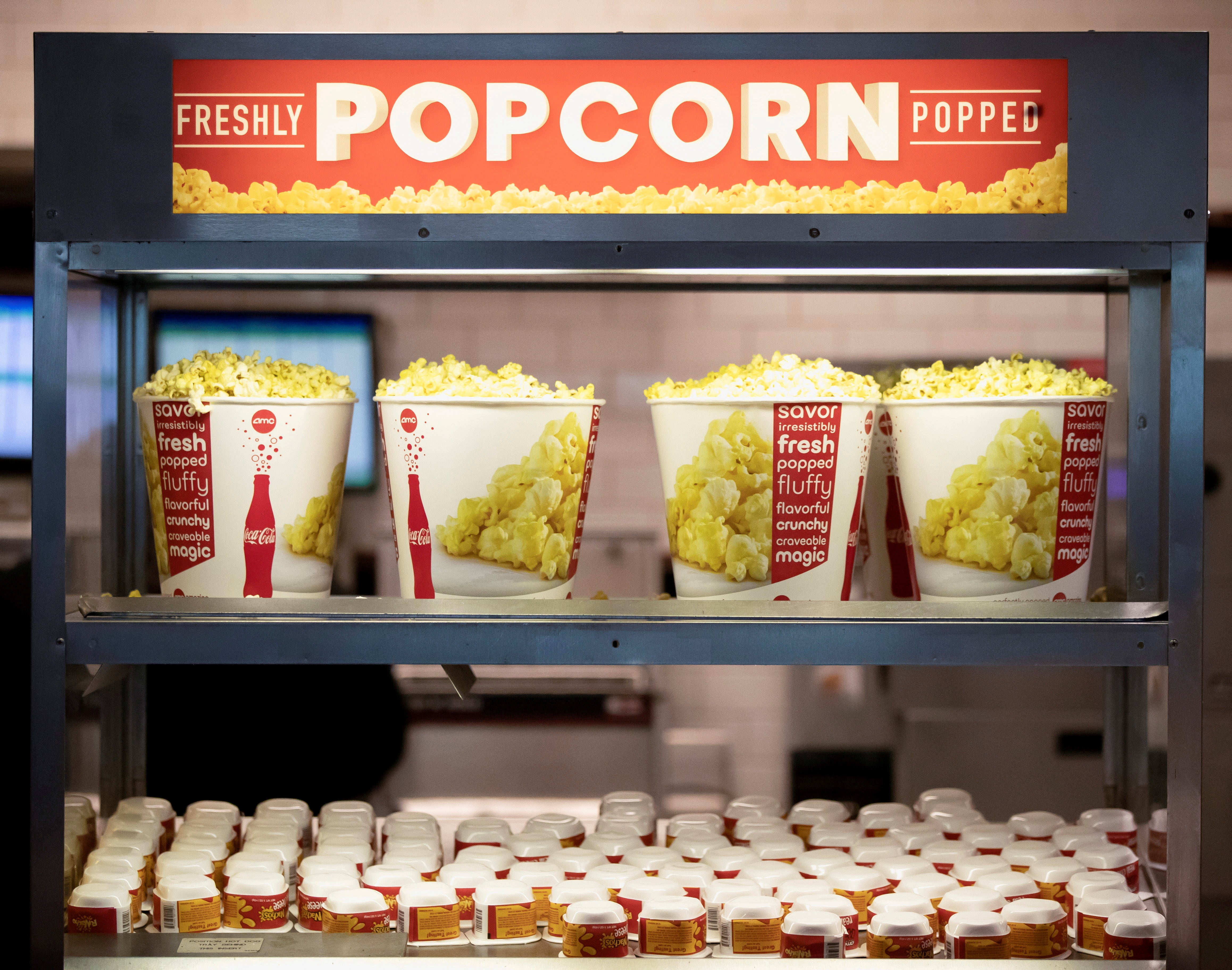 The price of the US cinema chain AMC doubled on Wednesday after it offered free popcorn to its small investors