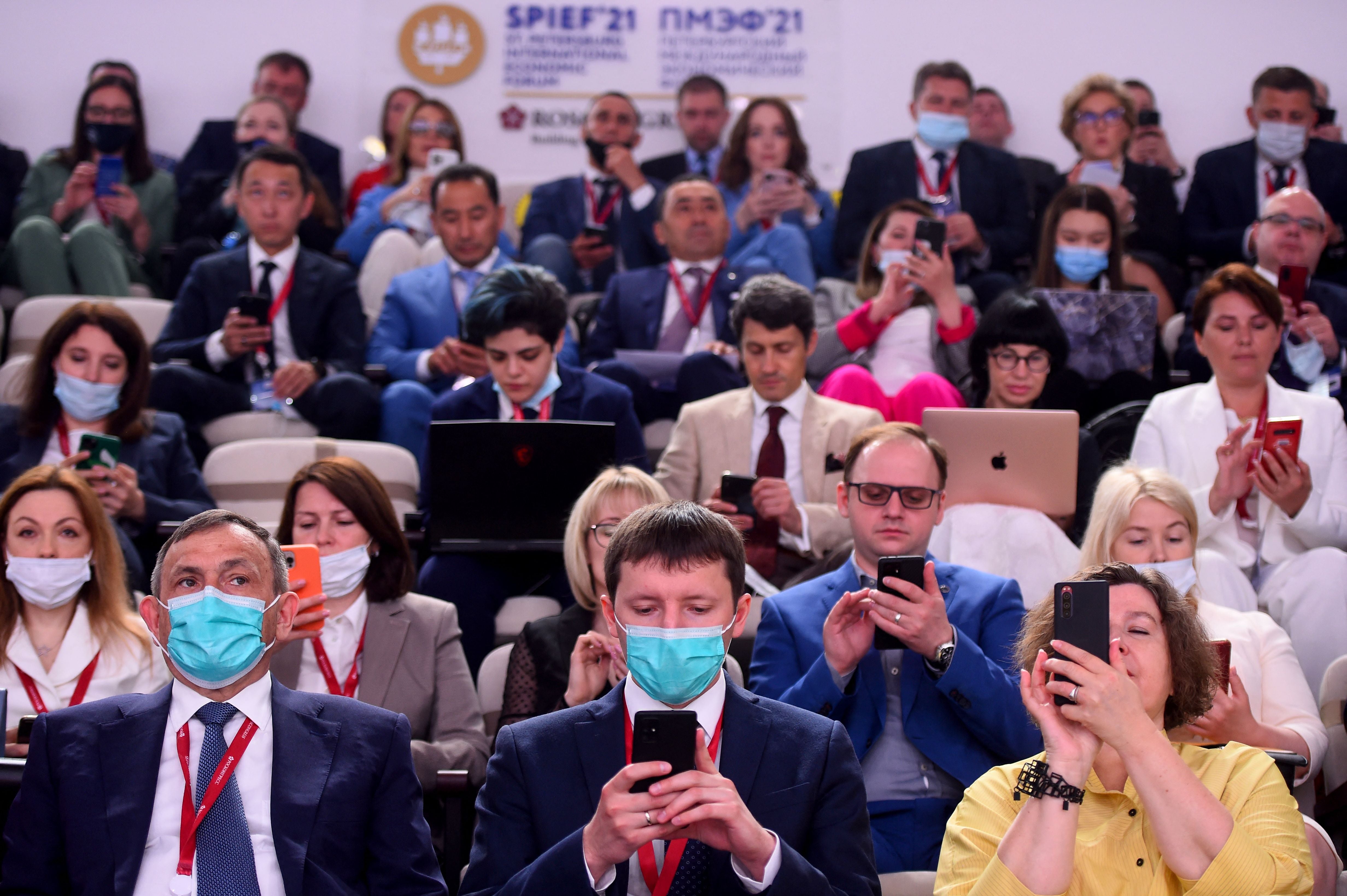 Participants attend a session of the St. Petersburg International Economic Forum