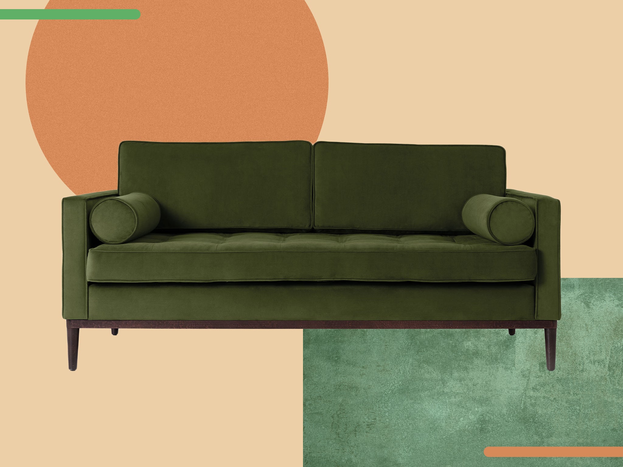 The sofa boasts mid-century shaping with vintage Deco glamour