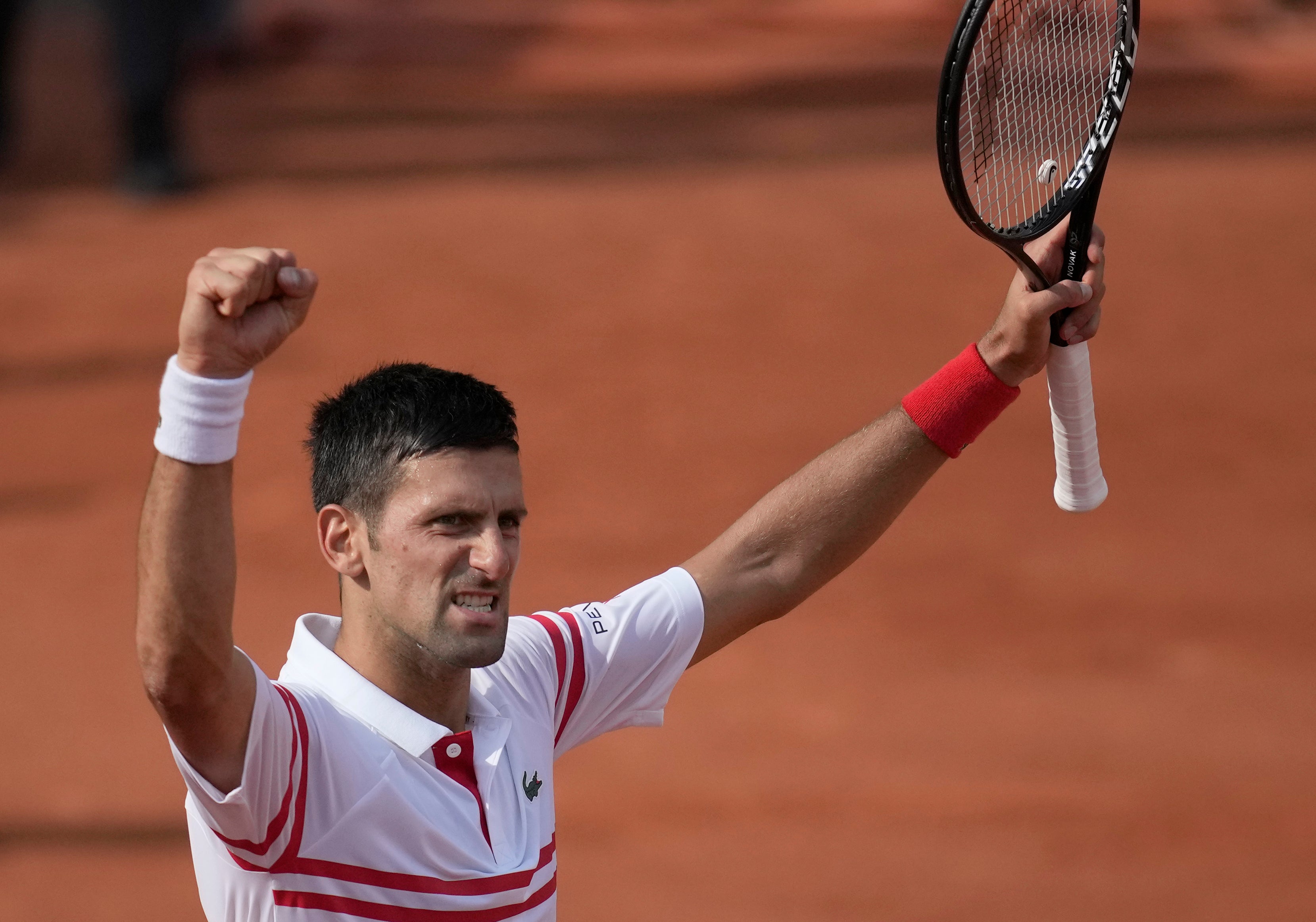 Novak Djokovic celebrates victory over Pablo Cuevas