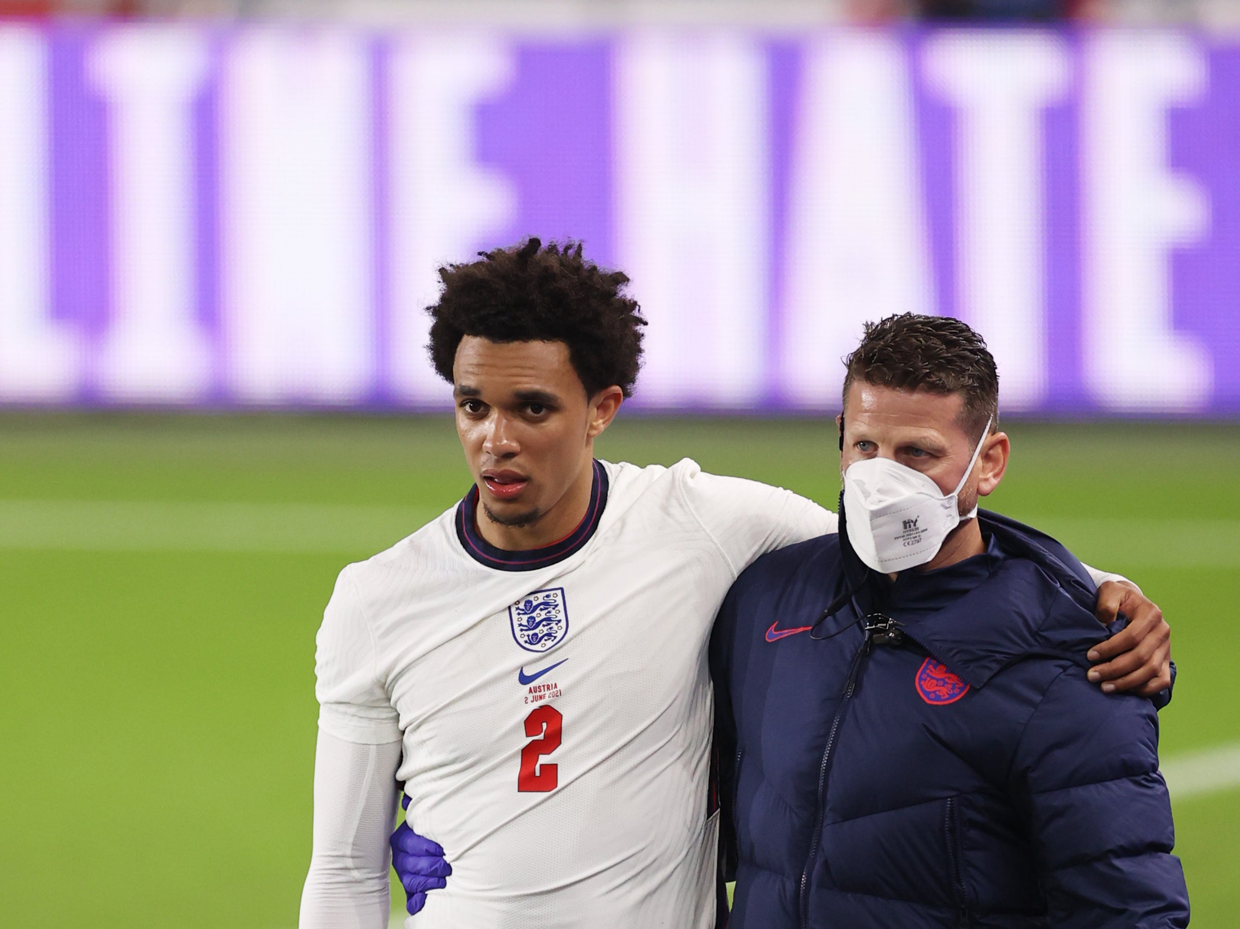 Trent Alexander-Arnold is helped off the pitch