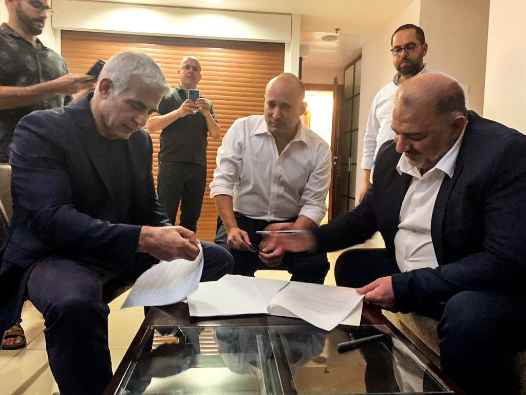 The United Arab List leader, Mansour Abbas; the Yamina Party leader, Naftali Bennett; and the Yesh Atid Party leader, Yair Lapid, in discussions on Wednesday in Ramat Gan, near Tel Aviv