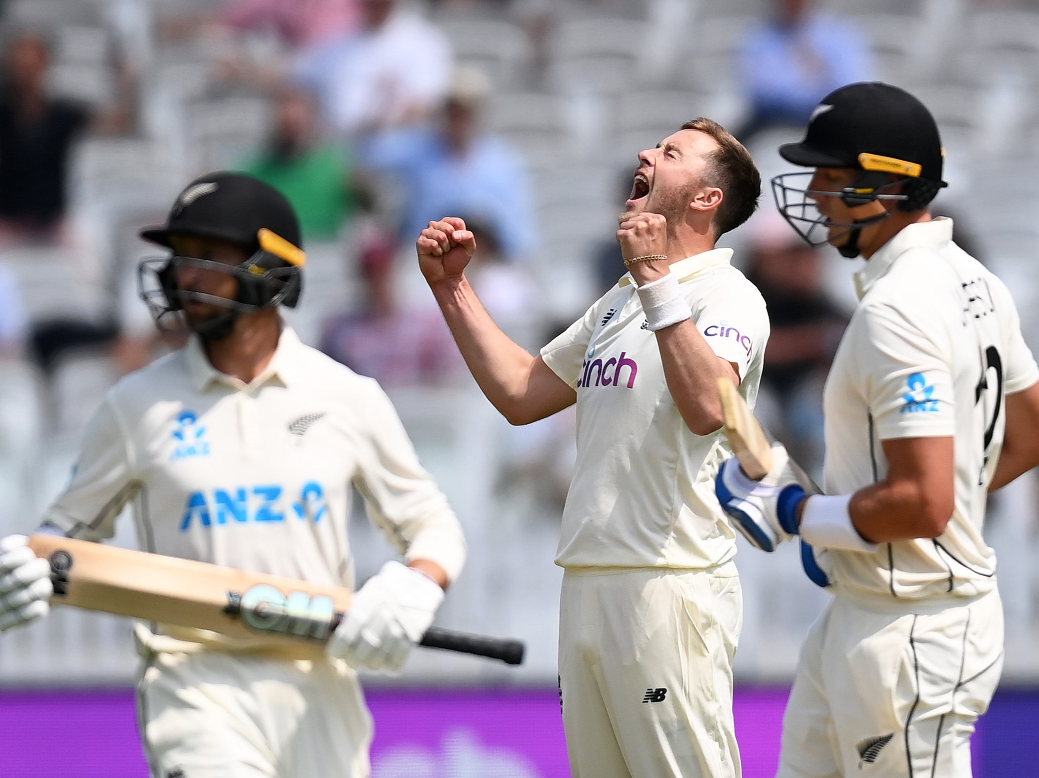 England’s Ollie Robinson celebrates taking the wicket of Kyle Jamieson