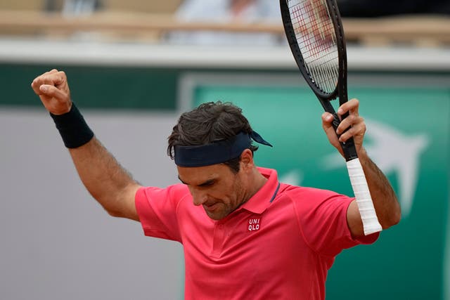 Roger Federer celebrates his victory over Marin Cilic