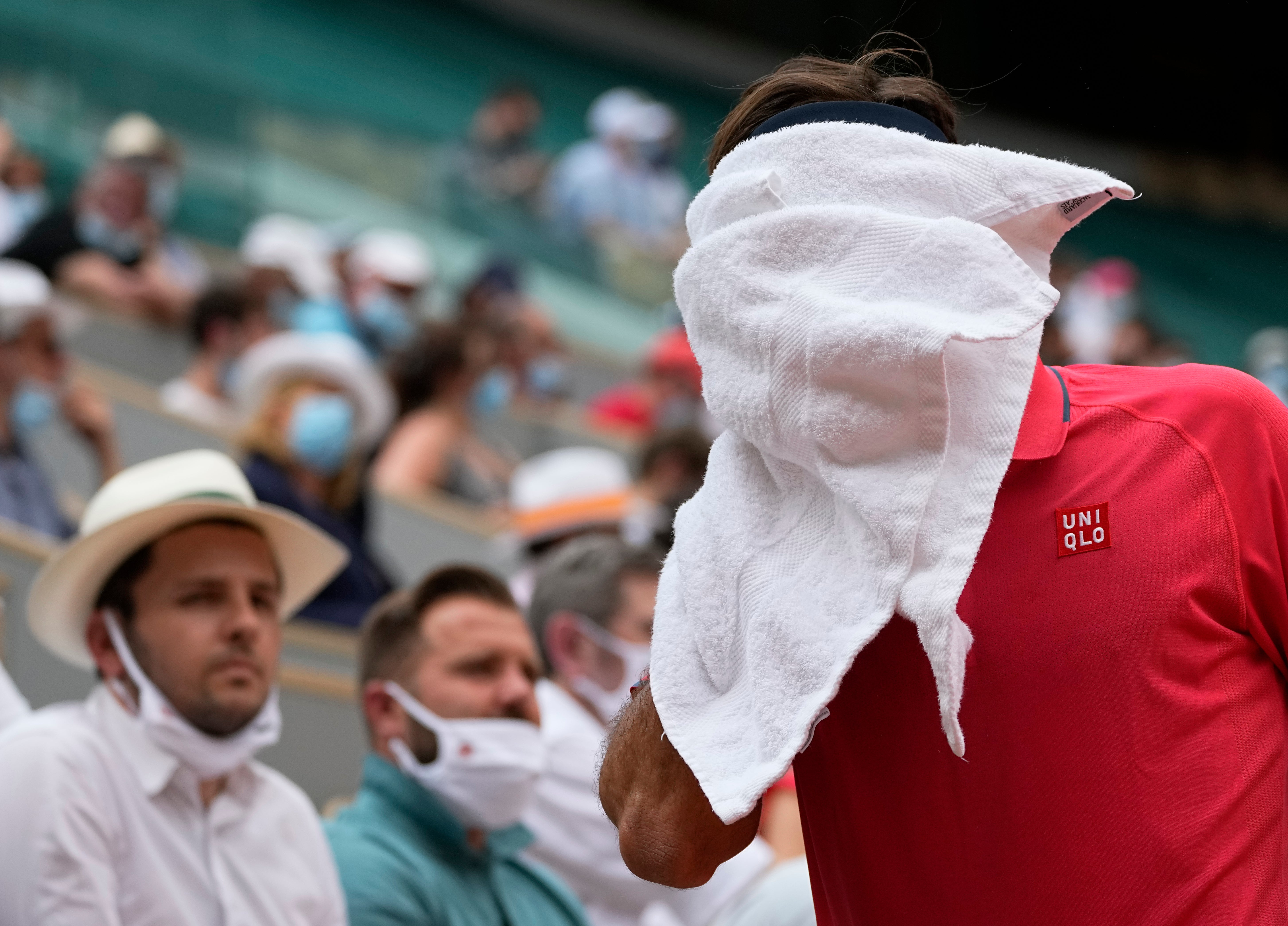 Roger Federer got into trouble over his use of a towel between points