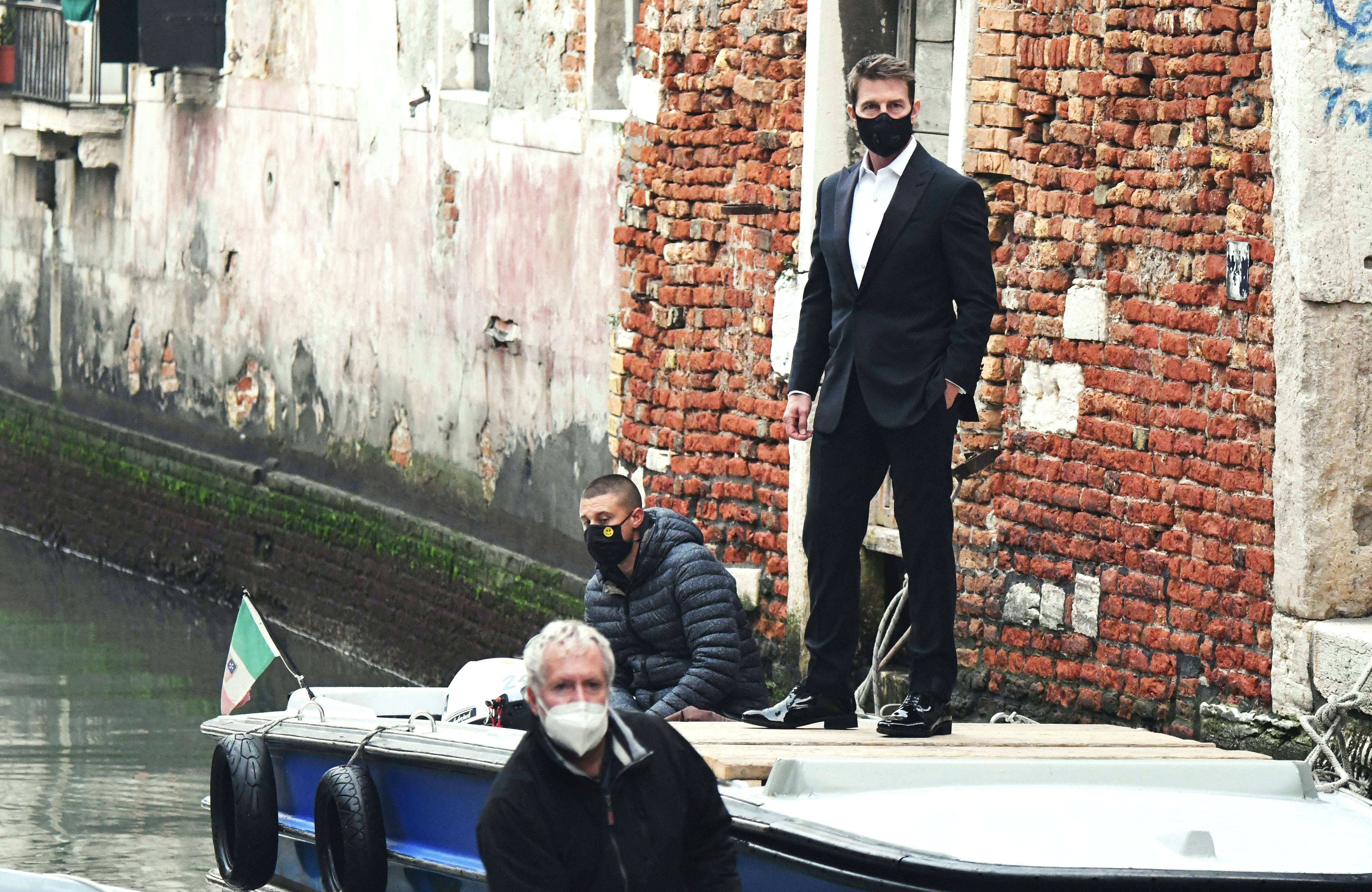 Tom Cruise stands on a boat during the shooting of ‘Mission Impossible 7’ in Venice in October 2020.