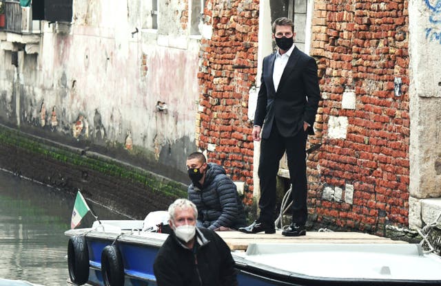 <p>Tom Cruise stands on a boat during the shooting of ‘Mission Impossible 7’ in Venice in October 2020.</p>