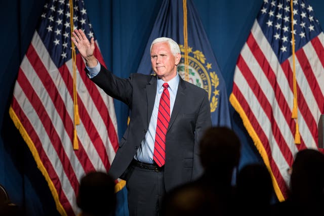 <p>Former Vice President Mike Pence waves after addressing the GOP Lincoln-Reagan Dinner on 3 June 2021 in Manchester, New Hampshire</p>