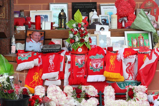 <p>Tributes left at the Hillsborough Memorial outside Anfield last month</p>