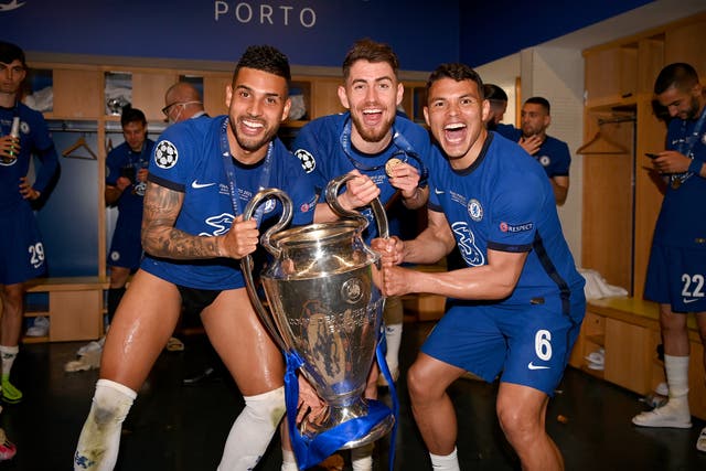 <p>Thiago Silva, right, celebrates winning the Champions League</p>