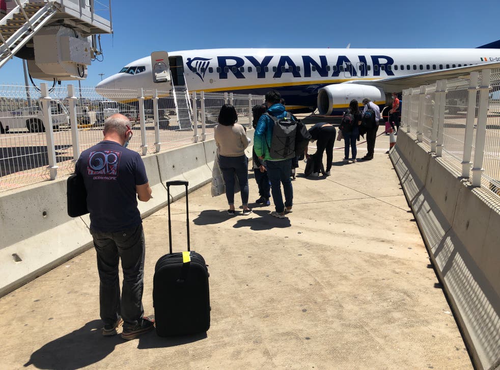 <p>Departing soon: Ryanair aircraft at Faro airport in Portugal</p>
