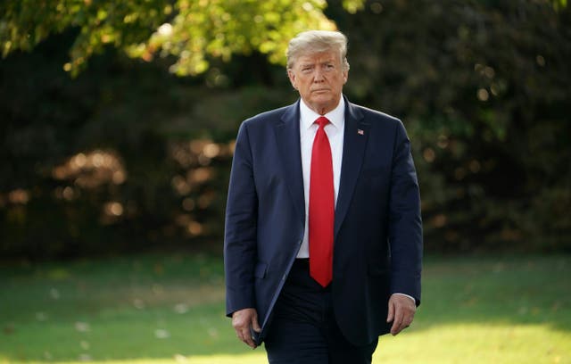<p>US President Donald Trump comes out of the Oval Office for his departure from the White House on September 16, 2019 in Washington, DC</p>