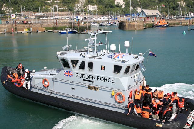 <p>A UK Border Force vessel returns to Dover after intercepting a small boat crossing in the Channel on Thursday</p>