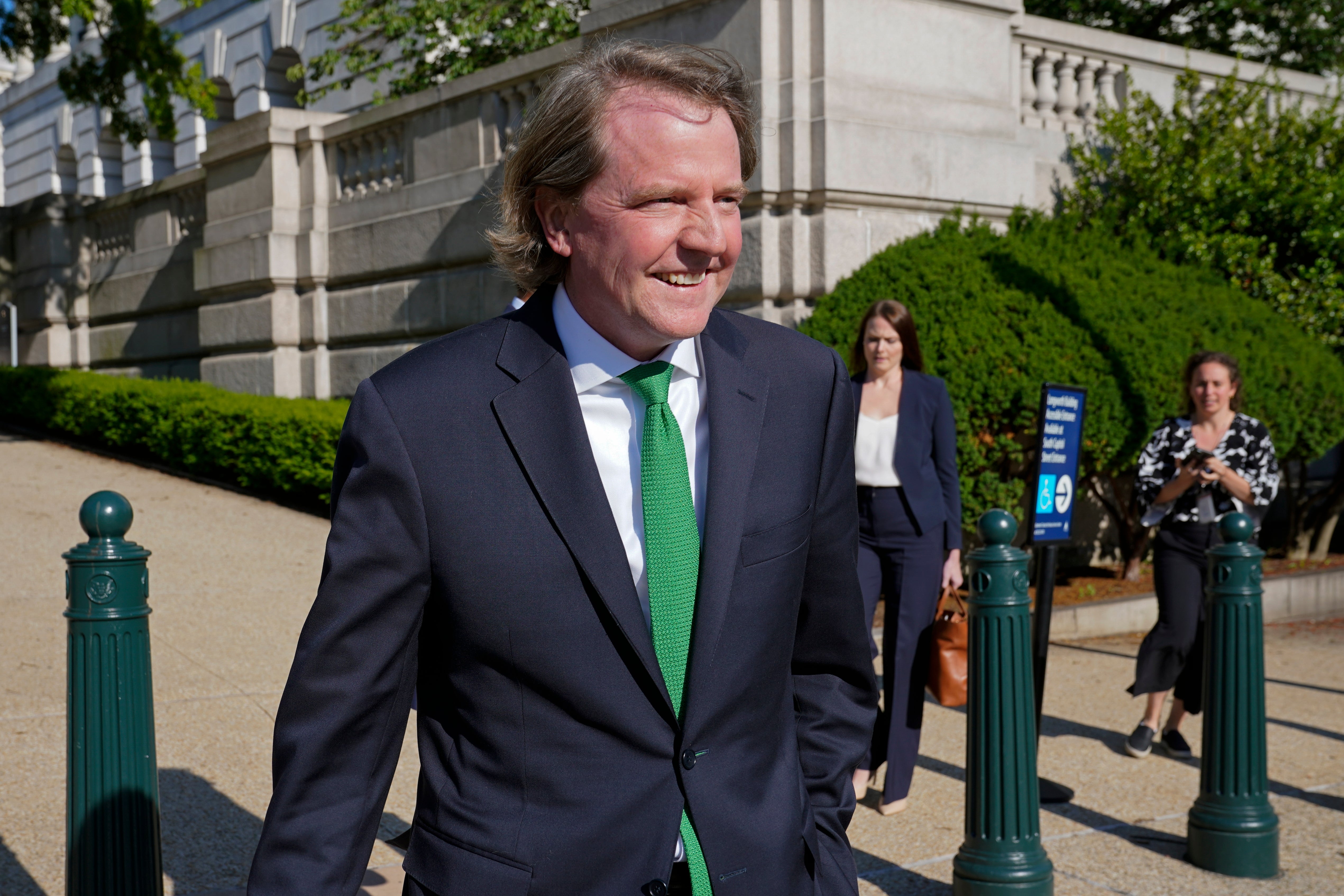Former White House counsel Don McGahn departs after appearing for questioning behind closed doors by the House Judiciary Committee on Capitol Hill in Washington, Friday, June 4, 2021