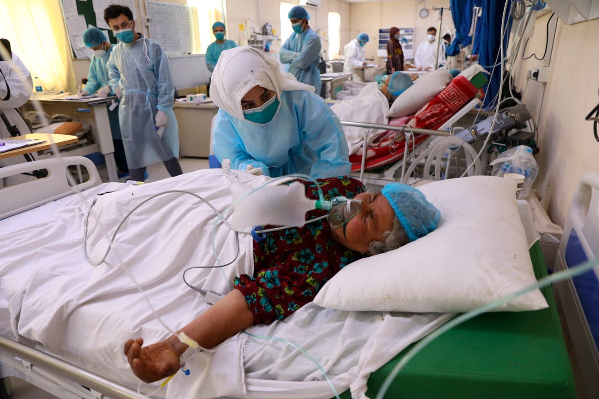 Amid brutal case surge, Afghanistan hit by a vaccine delay 