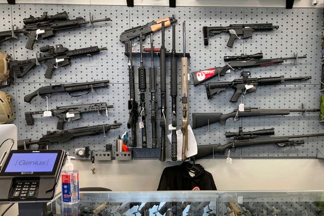 <p>Firearms are displayed at a gun shop in Salem, Oregon</p>