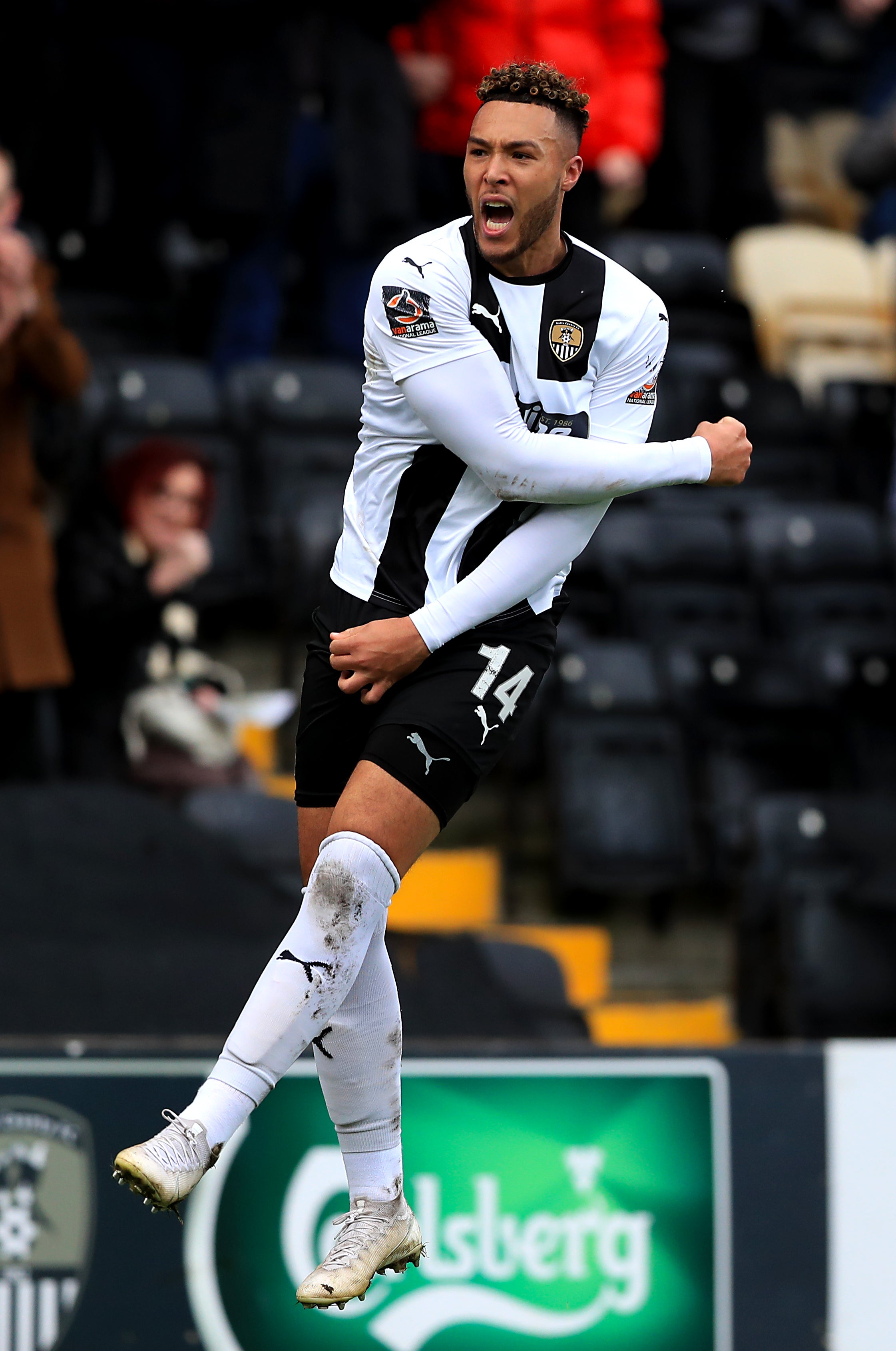 Kyle Wootton's double helped Notts County overcome Chesterfield.