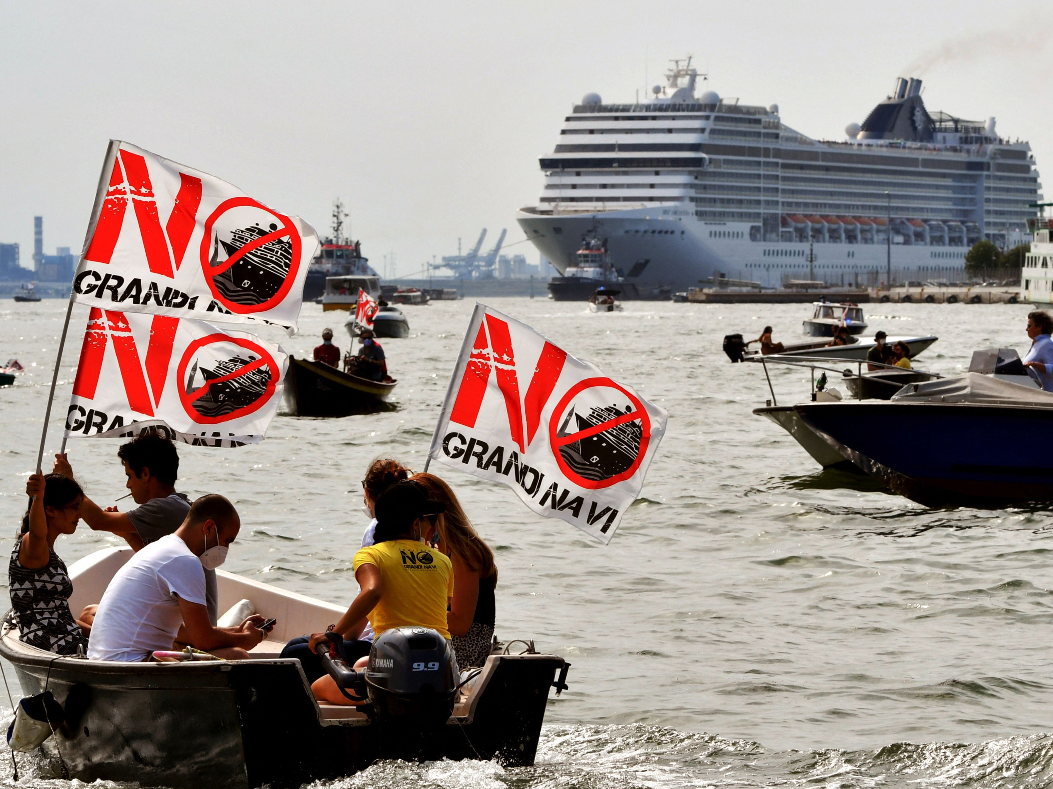 Environmental protesters demonstrate against the return of cruise ships to the lagoon city