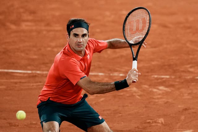 <p>Roger Federer keeps his eye on a backhand in his win over Dominik Koepfer</p>